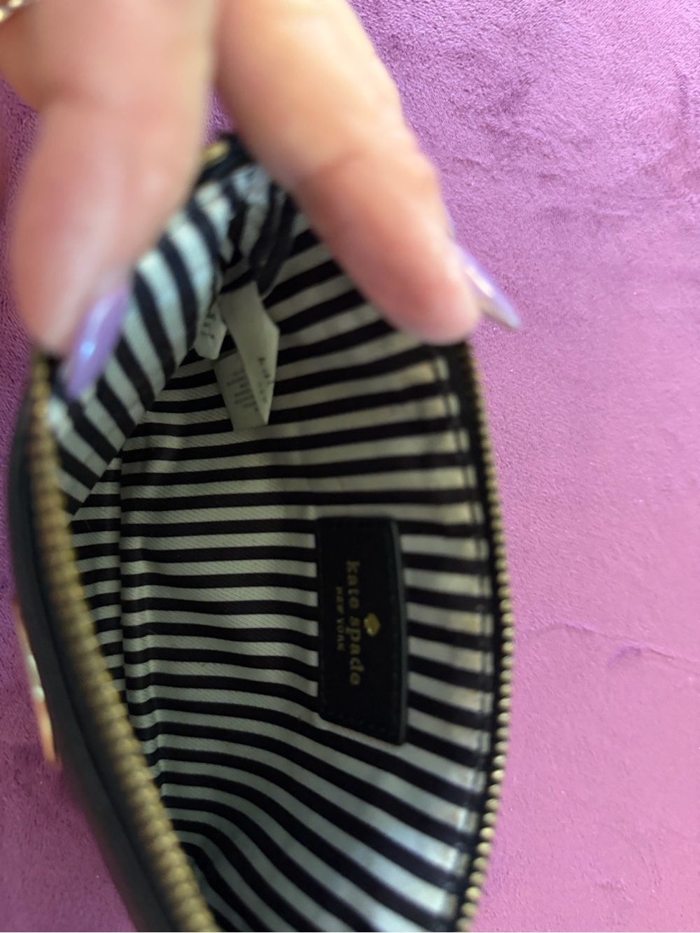 kate spade black cosmetic pouch with striped lining
